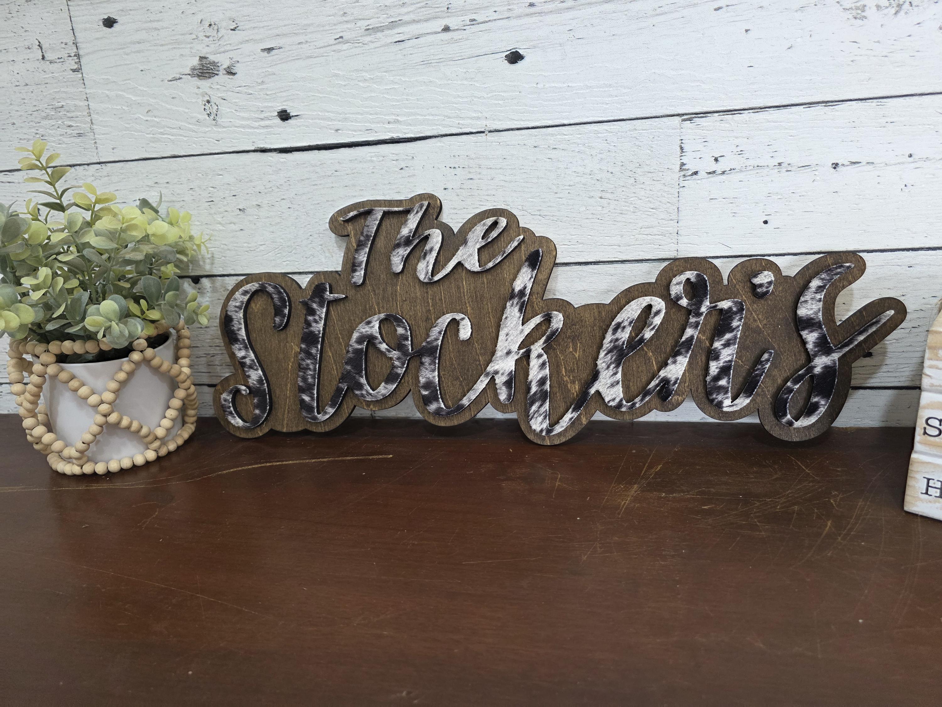 Small cowhide shelf sign