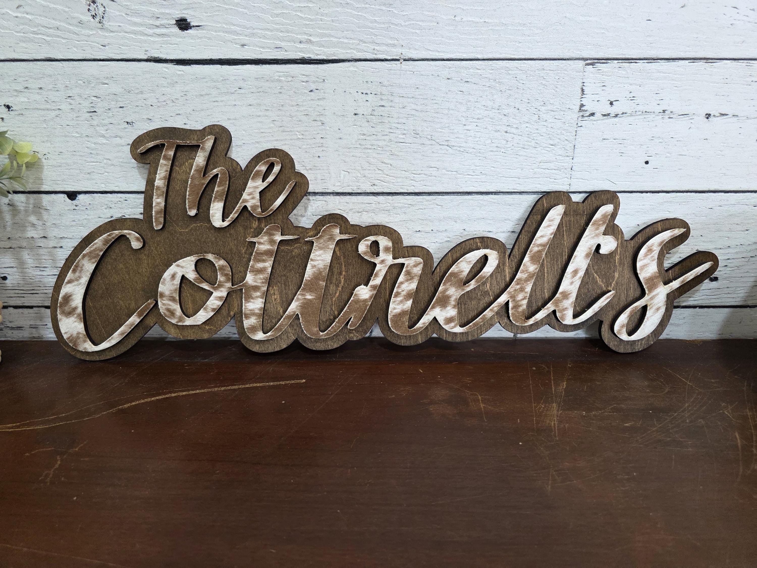 Small cowhide shelf sign